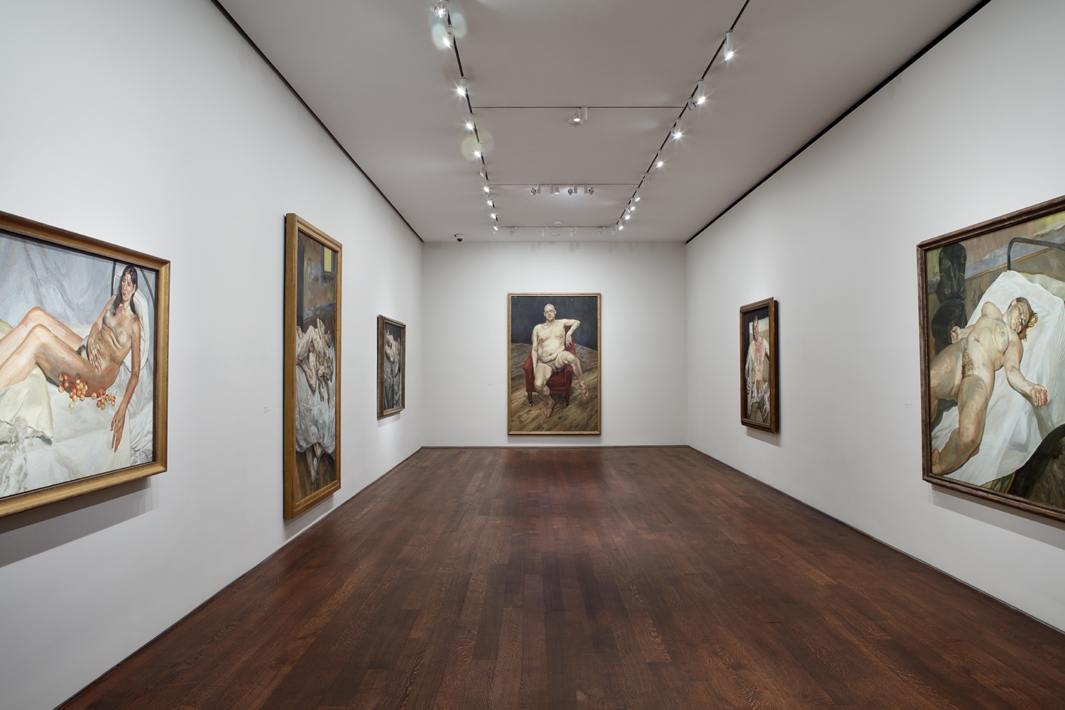 Installation view of&nbsp;Lucian Freud: Monumental&nbsp;at Acquavella Galleries from April 5&ndash;May 24, 2019. Left to right:&nbsp;Irish Woman on a Bed,&nbsp;2003-04, Lent by&nbsp;Private Collection;&nbsp;Sunny Morning&mdash;Eight Legs,&nbsp;1997, Lent by&nbsp;The Art Institute of Chicago; Joseph Winterbotham Collection (1997.561);&nbsp;Portrait on Gray Cover,&nbsp;1996, Lent by&nbsp;Private Collection;&nbsp;Leigh Bowery (Seated),&nbsp;1990, Lent by&nbsp;Private Collection;&nbsp;Eli and David,&nbsp;2005-06, Lent by&nbsp;Private Collection;&nbsp;Naked Portrait with Green Chair,&nbsp;1999, Lent by&nbsp;Private Collection.&nbsp;Photo by Kent Pell. Art&nbsp;&copy; The Lucian Freud Archive / Bridgeman Images.