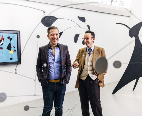 Alexander Rower, left, a grandson of Alexander Calder, and Joan Punyet Miró, a grandson of Joan Miró, at the Calder Foundation with works by the modern masters.